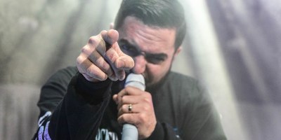 A Day to Remember lead singer Jeremy McKinnon performing at NRG Arena as part of the Degenerates North America Tour